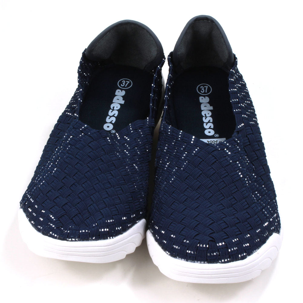 Navy blue woven fabric shoes with white rubber soles. Front view.