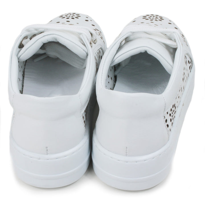 White training shoes with white rubber soles. Punched holes patterns over the entire shoes. Three holes while flat laces. Back view.