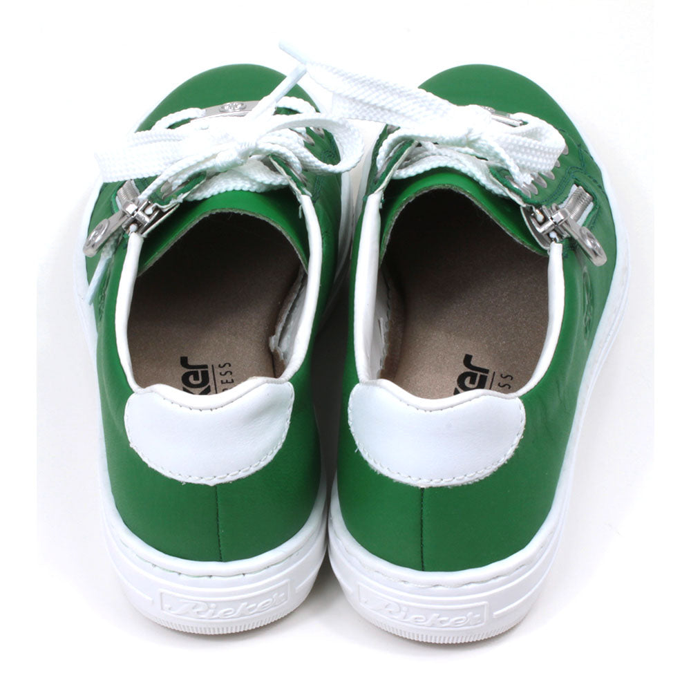 Rieker green trainers with white rubbers soles. White laces adjustment with silver Rieker badge on the bottom lace rung. Side zips for fitting. Back view.