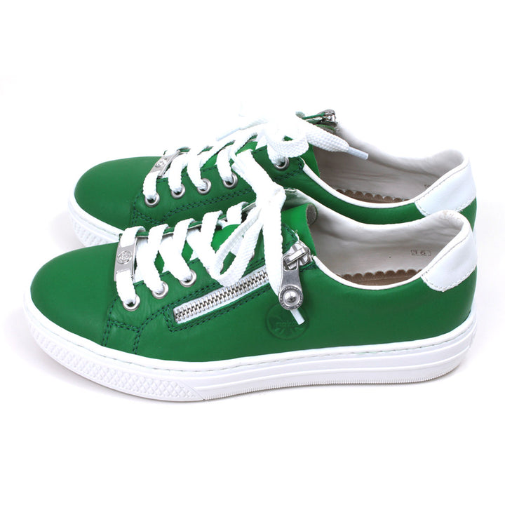 Rieker green trainers with white rubbers soles. White laces adjustment with silver Rieker badge on the bottom lace rung. Side zips for fitting. Side view.
