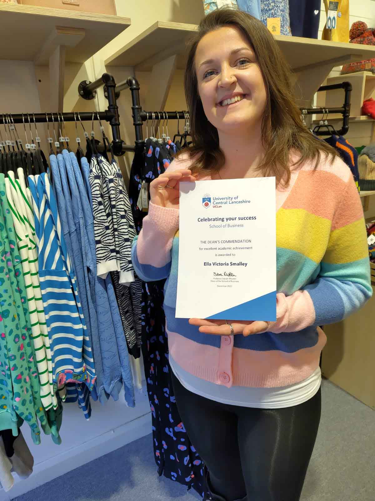 Ella with her Dean's Award certificate from the University of Central Lancashire. 