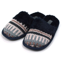 Jo and Joe mule slippers with navy blue fur inside and a matching band of fur over the foot. Chunky knitted uppers in navy, sky blue, white and rose gold. Angled view.