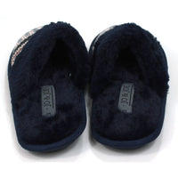 Jo and Joe mule slippers with navy blue fur inside and a matching band of fur over the foot. Chunky knitted uppers in navy, sky blue, white and rose gold. Back view.