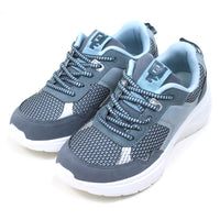 B Active grey and sky blue lace up trainers with padded and ankles and white soles. The trainers have a sports styling. Angled view.