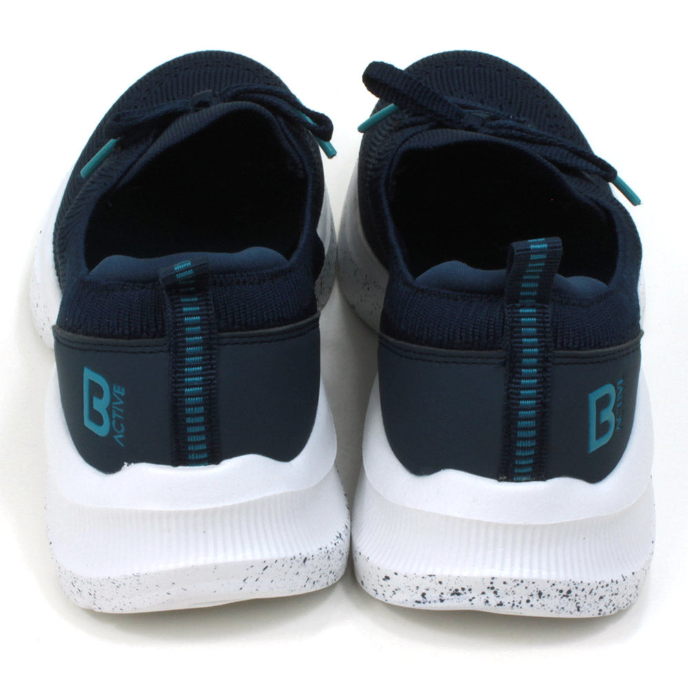 B Active navy blue slip on stretch fabric trainers with faux laces. Padded ankles. White speckled soles. Back view.