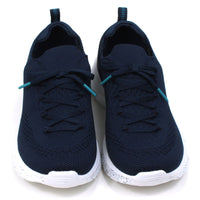 B Active navy blue slip on stretch fabric trainers with faux laces. Padded ankles. White speckled soles. Front view.