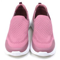 B Active pink slip on stretch fabric trainers. Padded ankles. White soles. Front view.