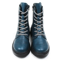 Rieker peacock blue combat boots. White and blue striped round laces. Fitting is using zips. Solid soles. Front view.