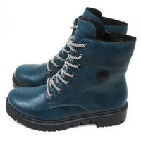 Rieker peacock blue combat boots. White and blue striped round laces. Fitting is using zips. Solid soles. Side view.