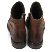 Rieker brown leather two tone brown ankle boots. Cross stitching detail over the ankle. Chelsea boots shape. Back view.