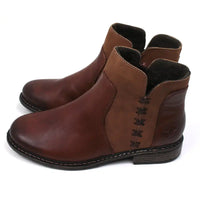 Rieker brown leather two tone brown ankle boots. Cross stitching detail over the ankle. Chelsea boots shape. Side view.