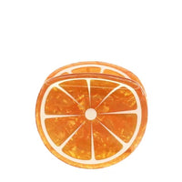 Hair clip in the shape of a slice of orange on a white background.