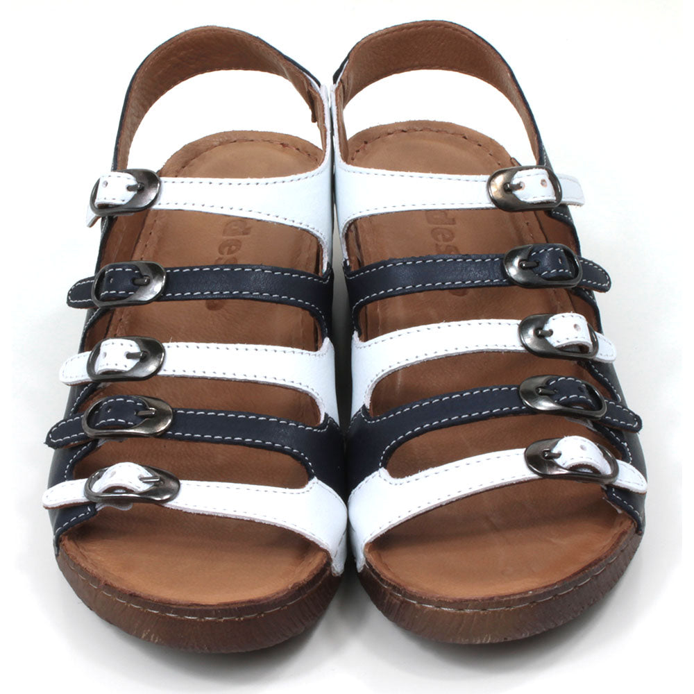 Adesso Astrid five buckled strap sandals in navy blue and white. Ankle strap. Low heels. Front photograph.