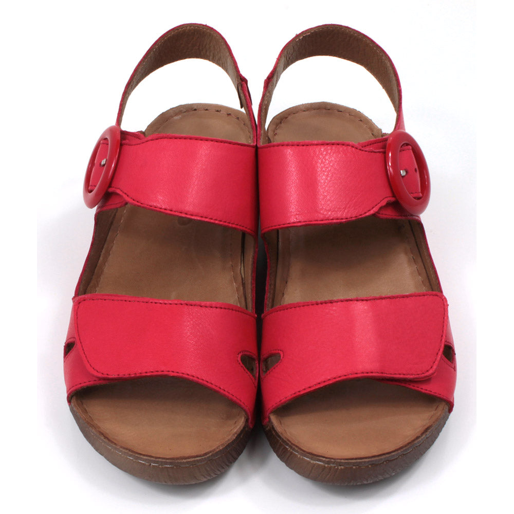 Adesso Lily sandals in salsa red. Double foot straps and ankle strap. Red buckle. Low heels. Front view.