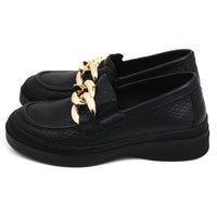 Adesso black loafers with chunky three link gold chain detail. Side view