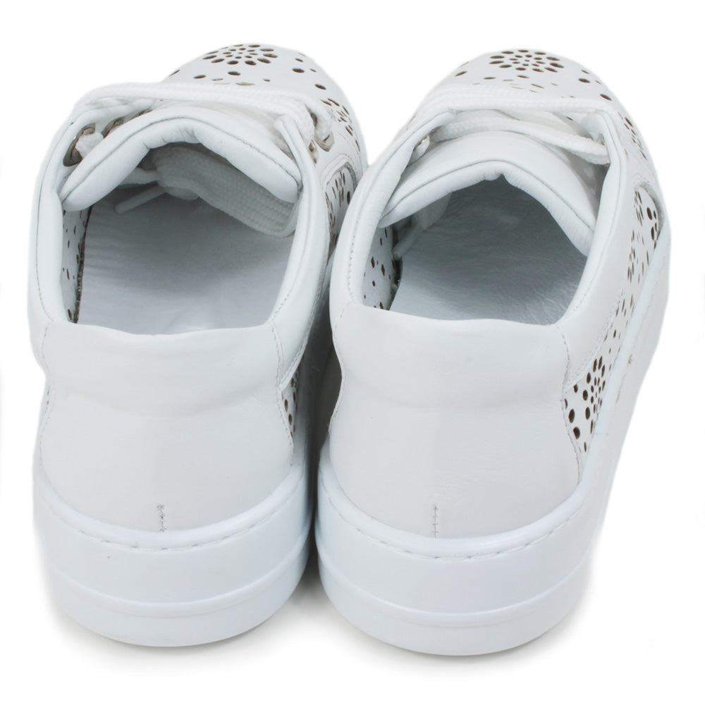 Adesso white training shoes with white rubber soles. Punched holes patterns over the entire shoes. Three holes while flat laces. Back view.