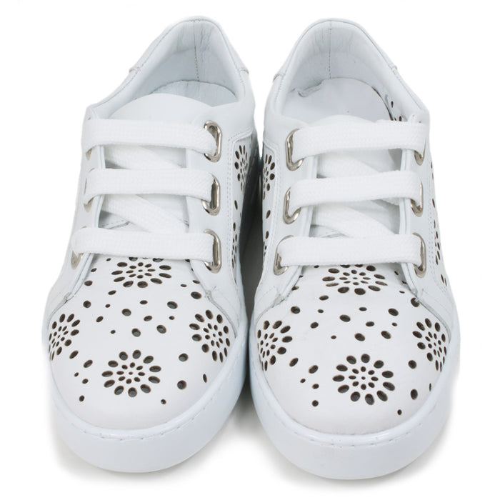 Adesso white training shoes with white rubber soles. Punched holes patterns over the entire shoes. Three holes while flat laces. Front view.