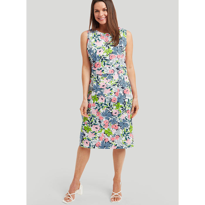 Knee length sleeveless dress. Boat neckline and a defined waistline. A pastel floral print. 