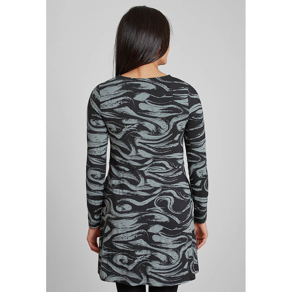 Back of tunic in a black and silver waveprint with long sleeves. 