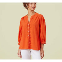 Orange shirt with Notch neckline, silver buttons up the front with frill detailing. Gathered 3/4 length sleeve with lace trim. 