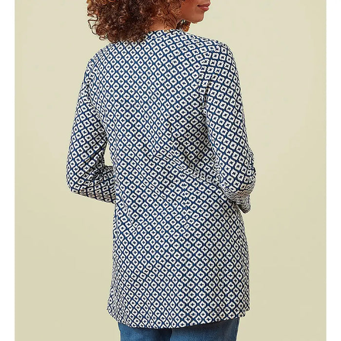 Geometric print tunic with three quarter length sleeves. 