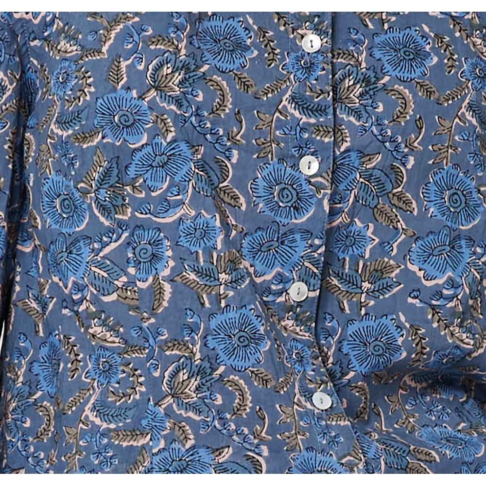 Crinkle fabric witha busy blue floral pattern, buttons for the front buttoning fastening of shirt. 