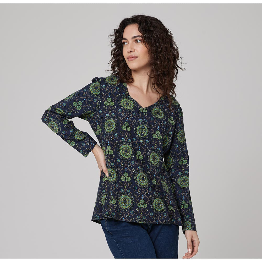 Navy based top with a green mandala Indian inspired print featuring blue highlights. Long sleeved with a v neckline. 