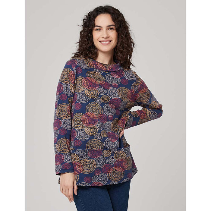 Royal blue based tunic with long sleeves and a rolled over boat neckline. Kanaroo pockets on the front and falls to mid thight. Circle and spot print in red, yellow and white. 