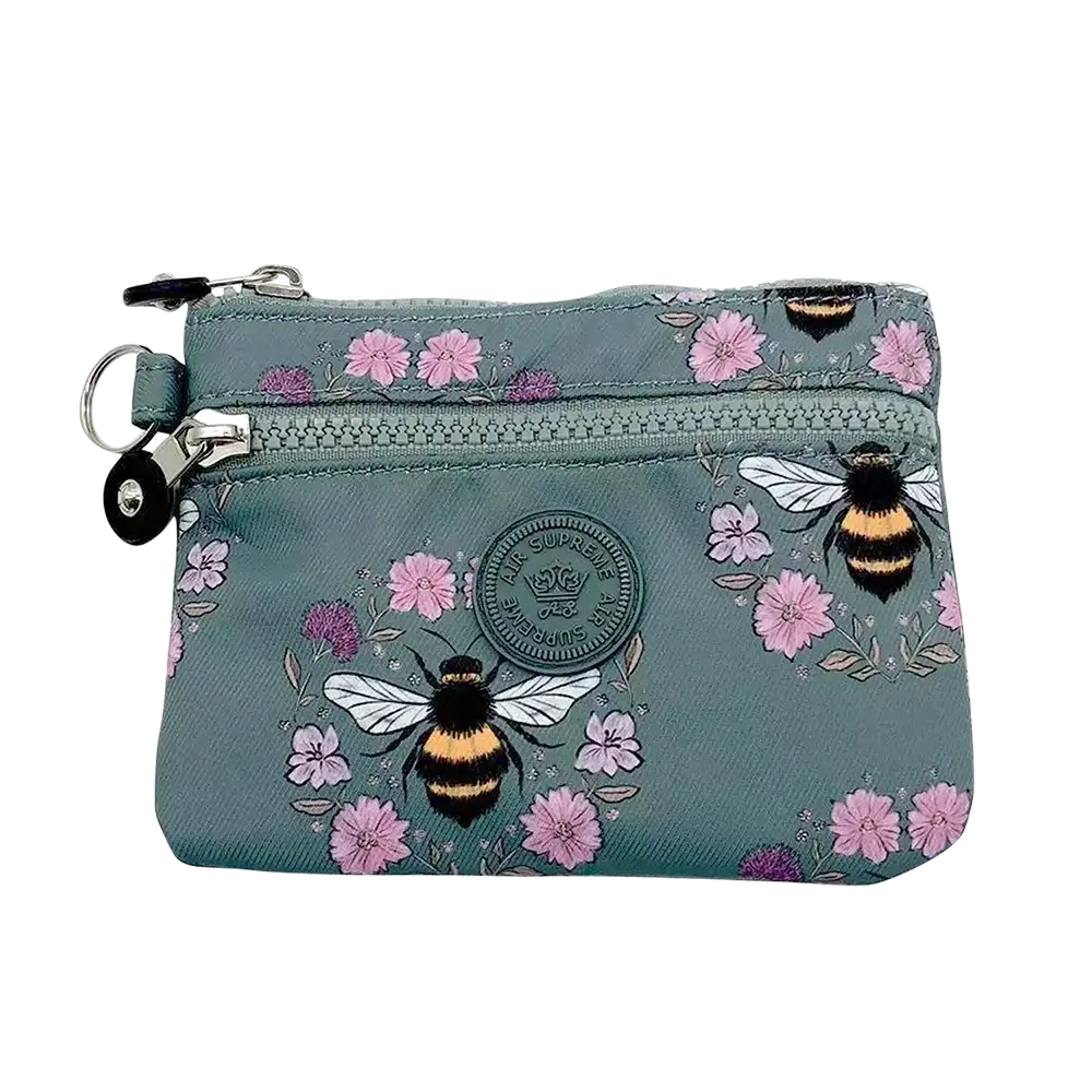 Small blue pouch with bee and floral pattern on a white background