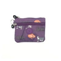 Purple pouch with cat illustrations on a white background