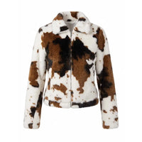 Faux fur animal pattern zip up jacket in a white studio environment.