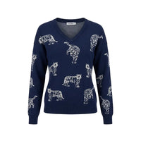 A navy blue V-neck knit sweater featuring an all-over white tiger print, displayed on a clean white background.