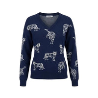 A navy blue V-neck knit sweater featuring an all-over white tiger print, displayed on a clean white background.