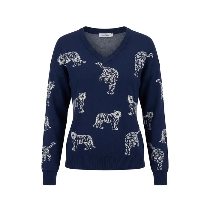 A navy blue V-neck knit sweater featuring an all-over white tiger print, displayed on a clean white background.