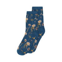 Pair of blue socks with floral pattern on a white background