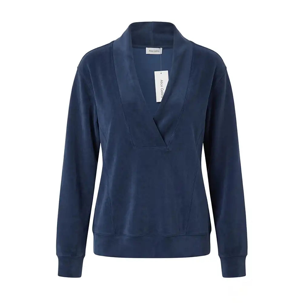 A navy blue long-sleeve top with a wide shawl collar and wrap-style front, shown on a plain white background with a hangtag attached.