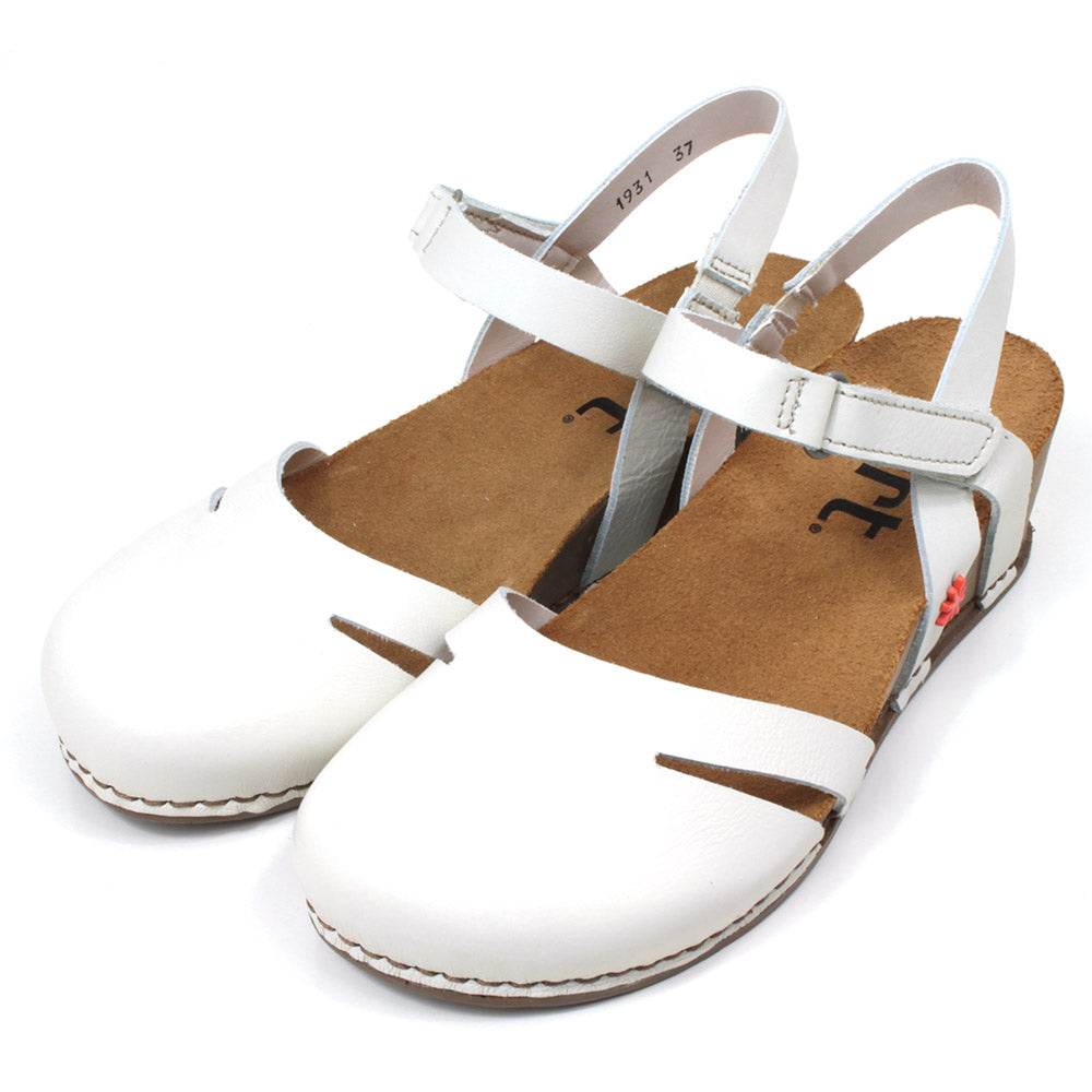 Art over the toe cream coloured sandals. Tan coloured footbeds. Elasticated ankle strap and Velcro adjustment across the foot. Angled view.
