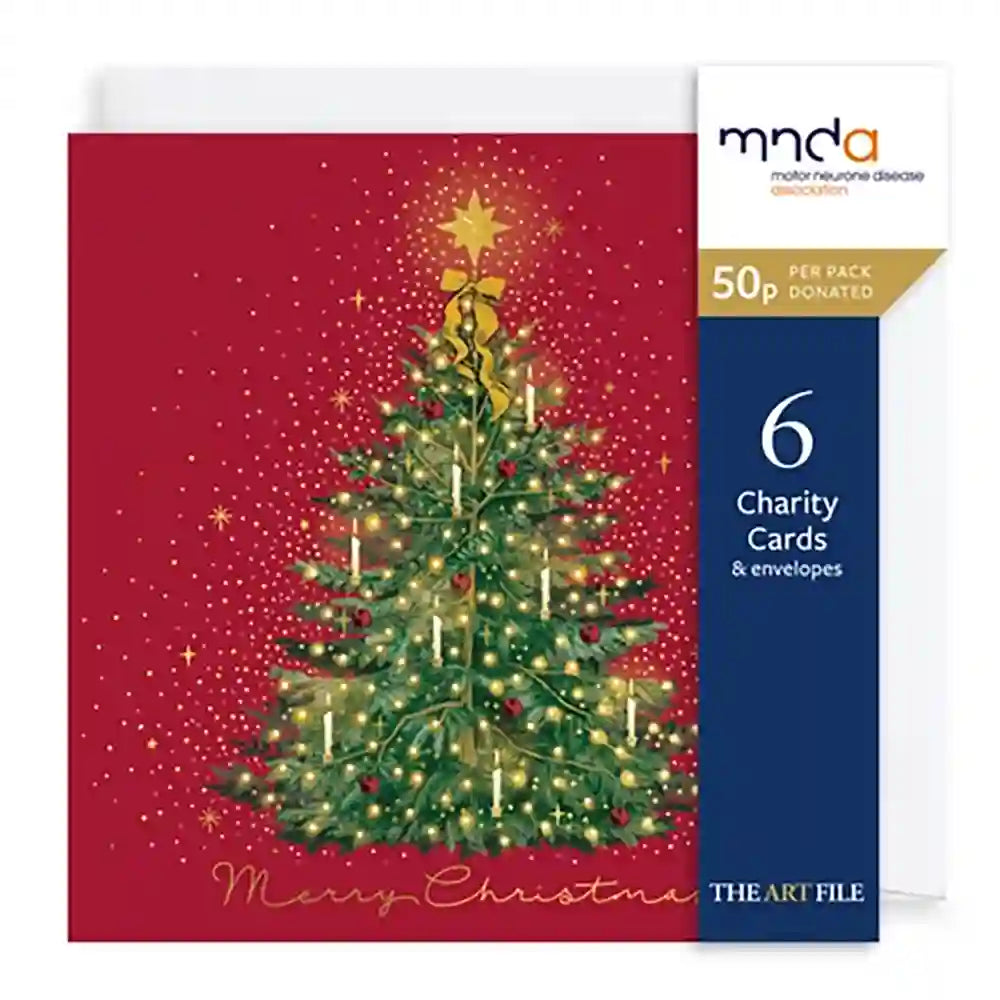 A Christmas-themed charity card set by The Art File for Motor Neuron Disease. The front card features a green Christmas tree with lights and a gold star on a deep red background, with 'Merry Christmas' written in gold script.
