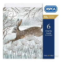 RSPCA 50-piece charity card pack featuring a winter watercolor illustration of a hare jumping among wildflowers, with a navy blue and gold side panel indicating 6 cards and envelopes per pack.