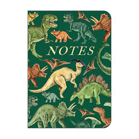 Notebook with dinosaur illustrations on a green background