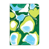 Notebook with a green, blue, and white abstract pattern on a white background