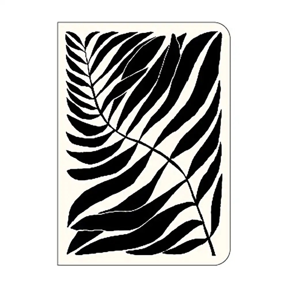 Notebook with black leaf pattern on a white background