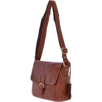 A brown leather messenger bag with a metal popper fastening flap, adjustable shoulder strap, and a rear security pocket.