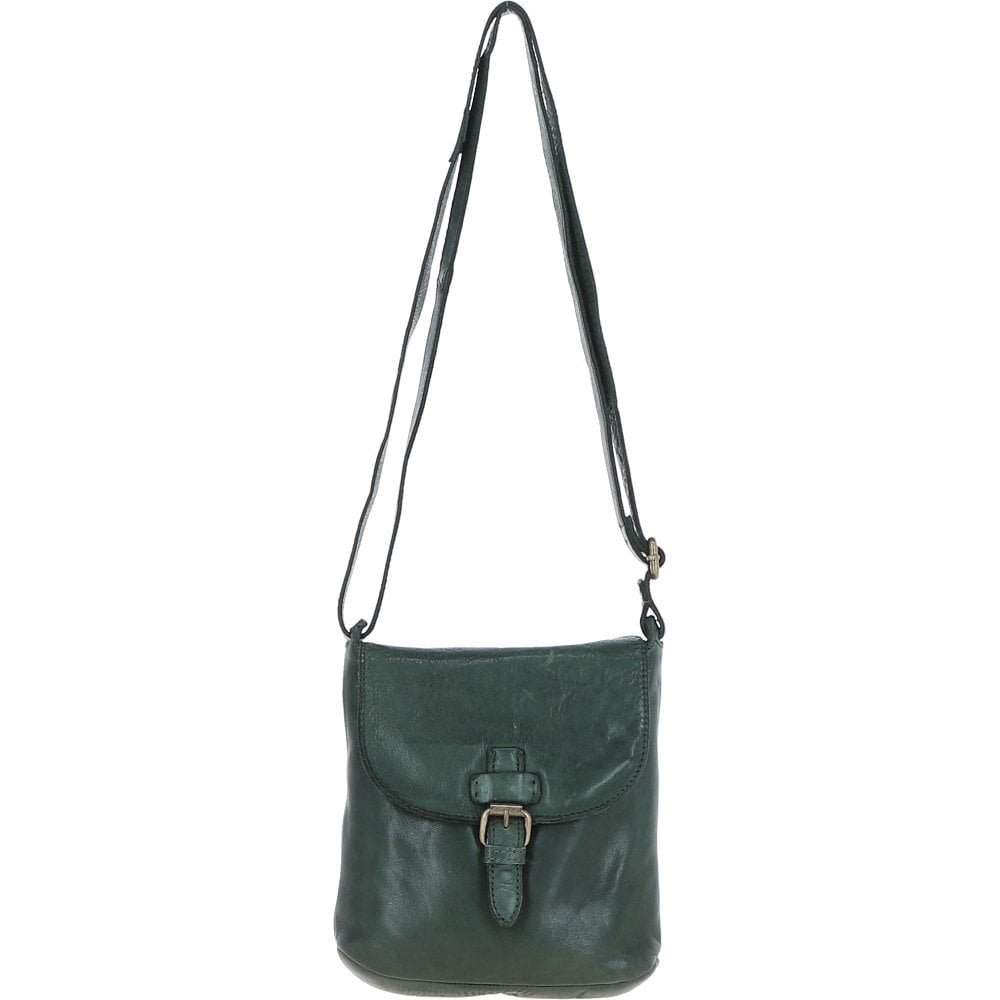 Green leather crossbody bag with a strap on a white background