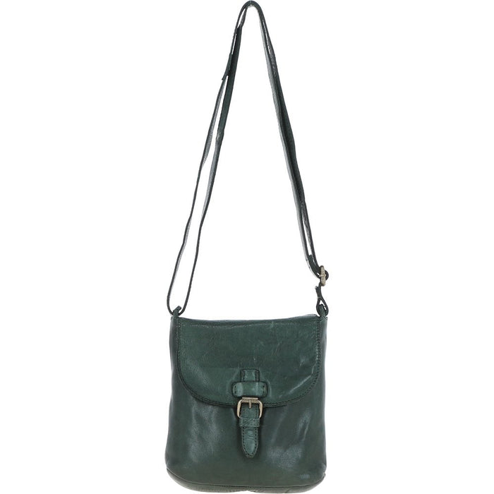 Green leather crossbody bag with a strap on a white background