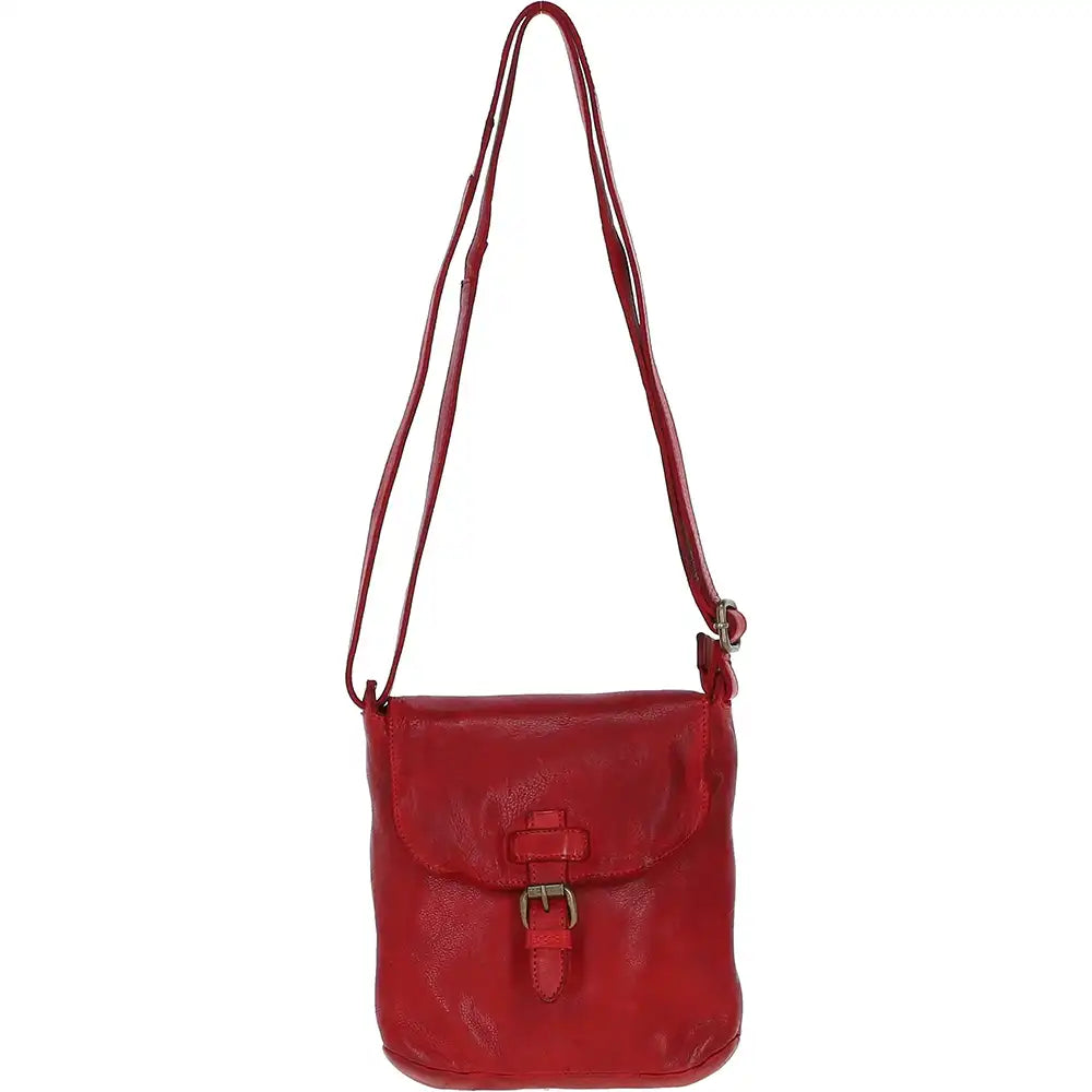 Red leather handbag with a strap on a white background