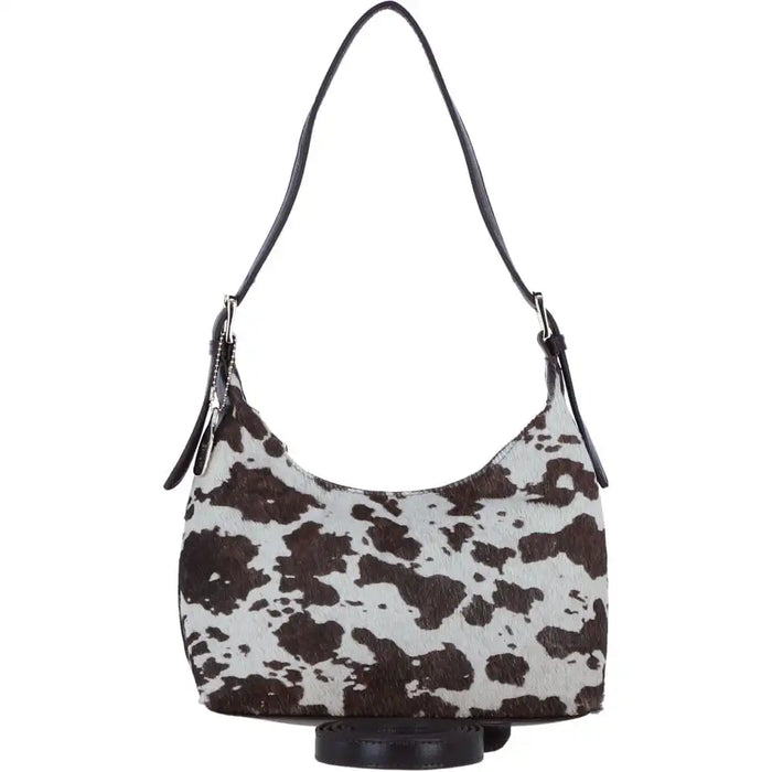 Hobo bag with brown and white cow print pattern on a white background