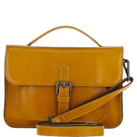 Yellow leather satchel with a strap on a white background