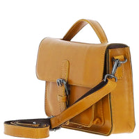 Tan leather handbag with a shoulder strap on a white background