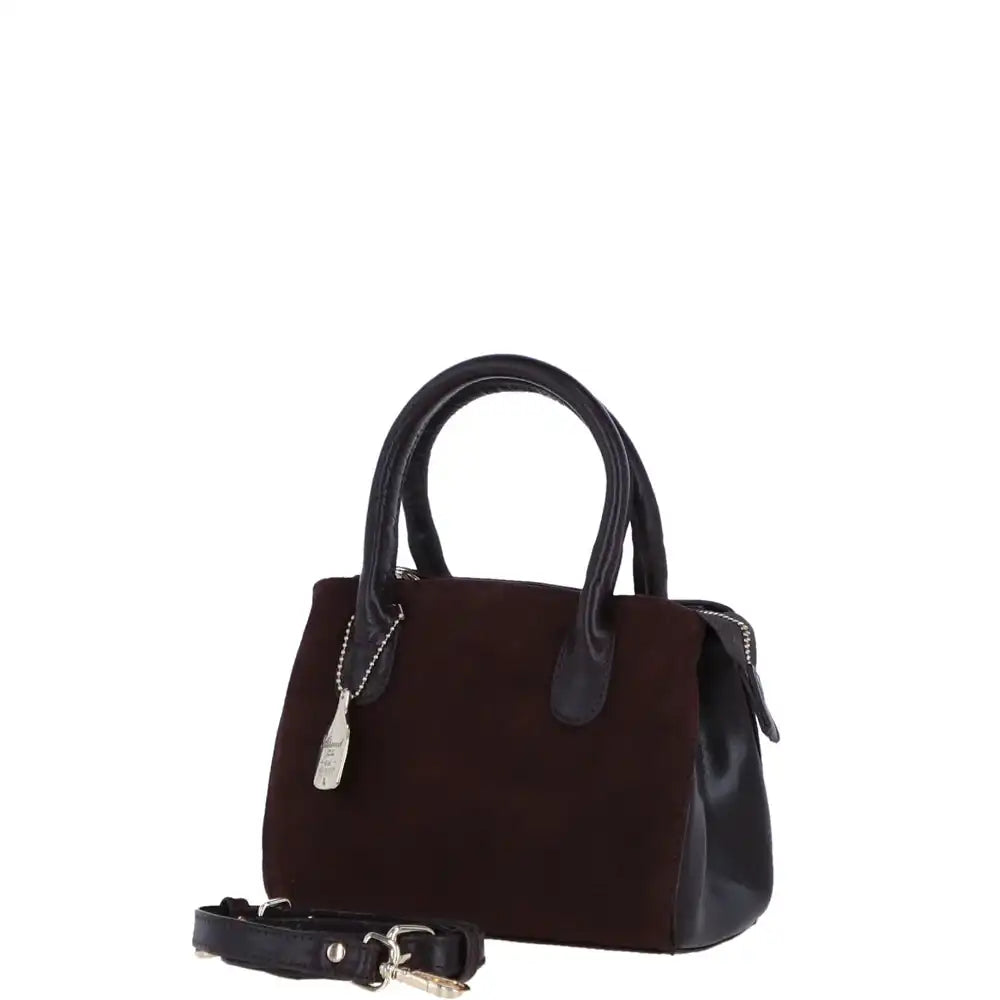 Brown handbag with black handle and strap on a white background